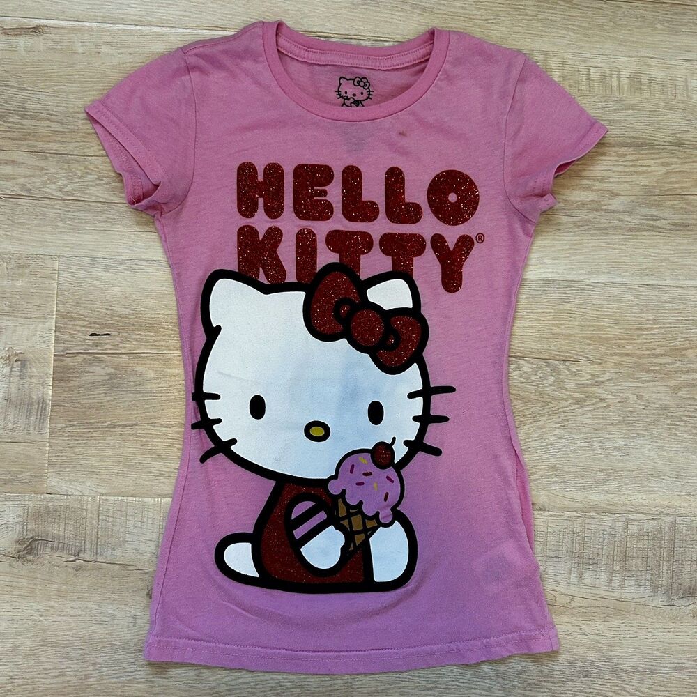 Sanrio Hello Kitty graphic t-shirt features a vibrant pink color Size Medium